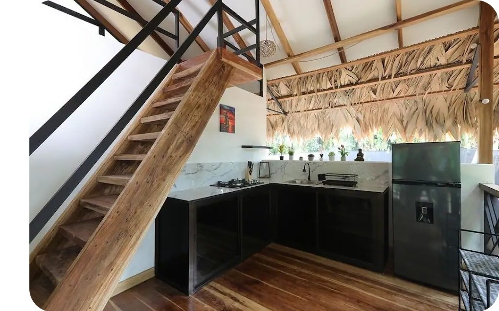 Bungalow kitchenette with hardwood floors and full appliances