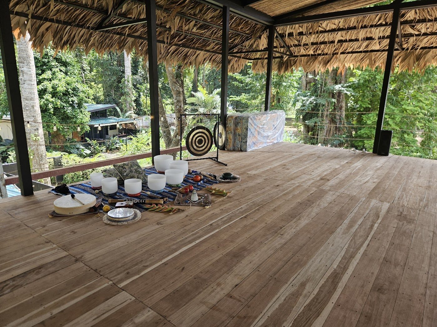 Crystal singing bowls arranged on the open-air ceremony deck